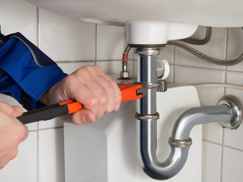 A licensed plumber repairing piping. For tricky or big leaks, the right tool and training make all the difference